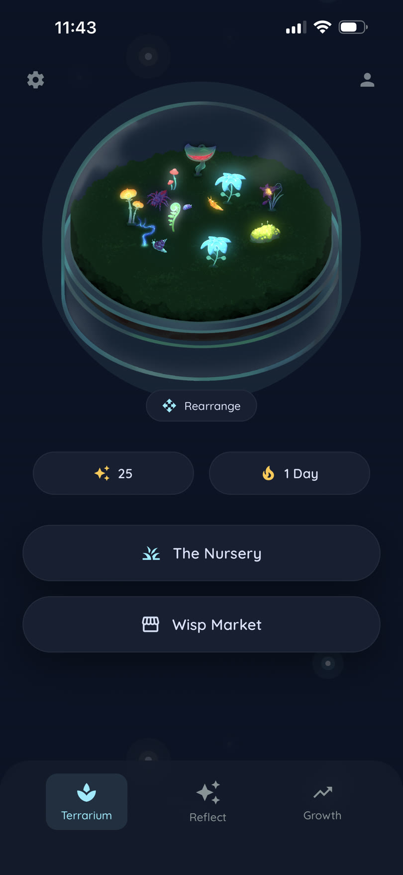 The terrarium tab, showing a glowing dome of plants and creatures, stardust and streak counters, and a bottom tab bar.